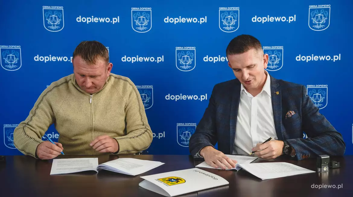 podpisanie umowy ul. Jaśminowa w Skórzewie